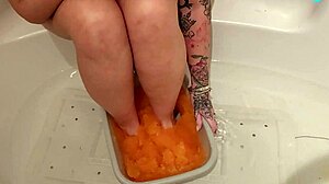 blonde milf with natural tits and big ass performs solo feet sploshing fetish.