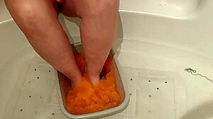 blonde milf with natural tits and big ass performs solo feet sploshing fetish.