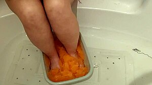 blonde milf with natural tits and big ass performs solo feet sploshing fetish.