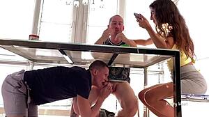 Sucked friend's dick under table.