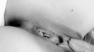 this busty milf is caressing her big tits in a homemade close-up, she's reaching orgasm