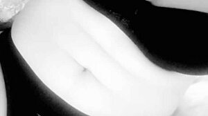 this busty milf is caressing her big tits in a homemade close-up, she's reaching orgasm