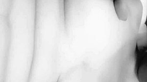 this busty milf is caressing her big tits in a homemade close-up, she's reaching orgasm