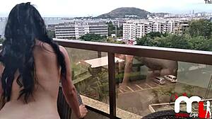Well-Endowed Black Fucks Young Brunette on Balcony for All to See