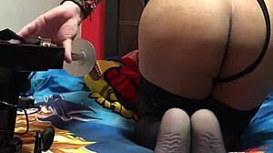 Little whore wearing latex dress bends over for anal assfucking in doggystyle position with stockings