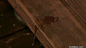 Slim blindfolded redhead bound and gagged in rough deepthroat torment