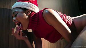 Slender Brazilian babe Luna C fingers her natural tits during Christmas masturbation