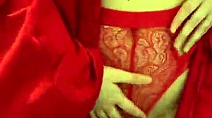 Brunette in red lingerie plays with herself?