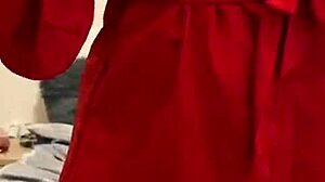 Brunette in red lingerie plays with herself?