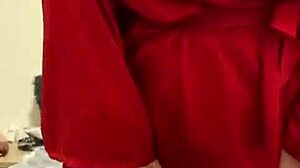 Brunette in red lingerie plays with herself?