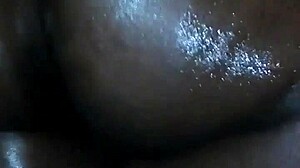 Massaging Oil on Ebony Milf’s Big Ass Before Fingering and Fucking