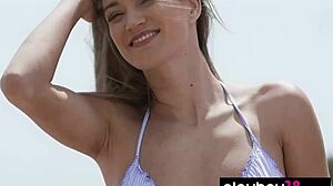 Nicole Fox Undresses Shaved Pussy At Beach