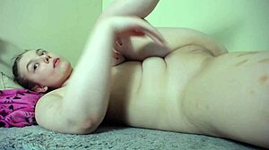 Teen dances naked, masturbating her wet shaved pussy until cumshot in homemade video