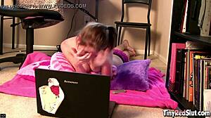 is that tiny red slut masturbating on webcam?