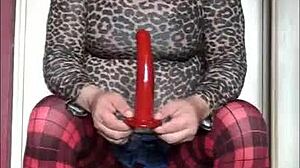 Watch the crossdresser deepthroat that dildo