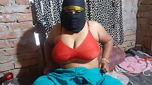 Sexy stepmom teases with her curves and smile