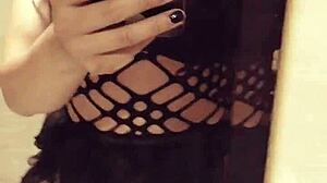 this asian crossdresser just chilling in his room, masturbating casually.