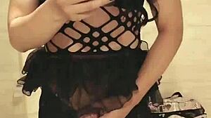 this asian crossdresser just chilling in his room, masturbating casually.