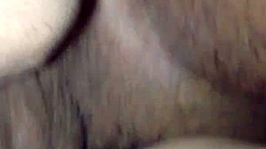 Amateur couple engages in doggystyle position.