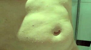 Enjoying A Relaxing Shower Session In A Cozy Hotel Room