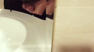 this asian crossdresser just chilling in his room, masturbating casually.