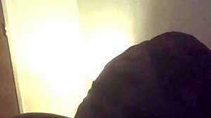 she's sucking that black guy's cock in a blowjob