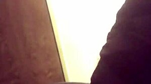 she's sucking that black guy's cock in a blowjob