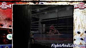 Redhead babe wrestles her lesbian opponent close-up