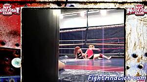 Redhead babe wrestles her lesbian opponent close-up