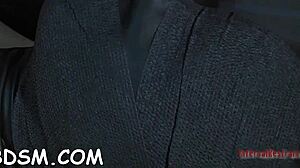 Busty redhead posing naked for the camera