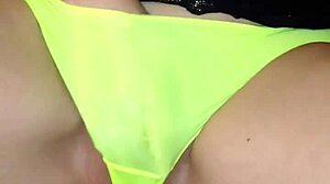 sexy milf in see-through yellow panties teasing herself