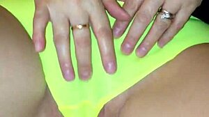 sexy milf in see-through yellow panties teasing herself