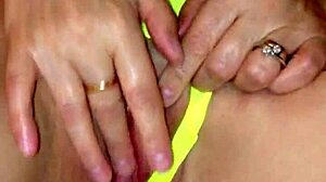 sexy milf in see-through yellow panties teasing herself