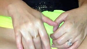 sexy milf in see-through yellow panties teasing herself