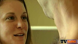 A stunning hottie shares a gentle kiss with her best friend