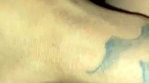 Ebony slut stuffs her pierced pussy with a pretty dildo in solo masturbation session