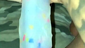 Ebony slut stuffs her pierced pussy with a pretty dildo in solo masturbation session