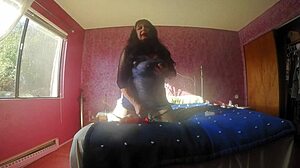 Michele in Lingerie Engages in Bedroom Shemale Play