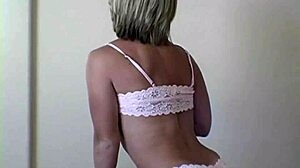 Sweet blonde babe poses in lingerie for a behind-the-scenes photoshoot