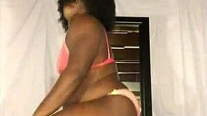 Sexy ebony shemale twerks ass to music