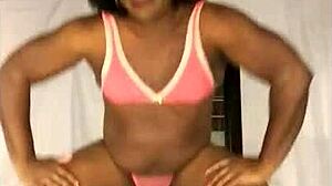 Sexy ebony shemale twerks ass to music