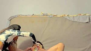 Dominatrix engages in assplay and fingering with submissive guy