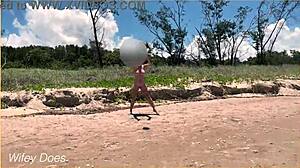 wife dares to play football nude on clothed public beach