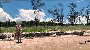 wife dares to play football nude on clothed public beach