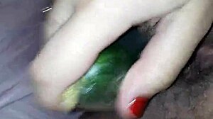 Claudia is having fun with her big cucumber, you know?