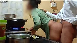 Indian sexy wife fucked hard while cooking in kitchen. Her hairless pussy takes monster cock.