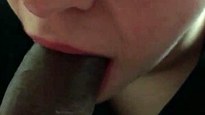 Close up lipstick blowjob on big black cock