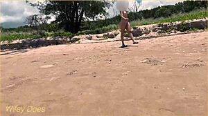 wife dares to play football nude on clothed public beach