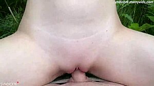 Blonde bent over in public outdoor setting