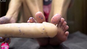 babe gives a sensual footjob to a rubber cock 😍 foot fetish fun